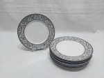 Jogo de 6 pratos de sobremesa em porcelana Real com guirlanda de flores e friso prata. Medindo 19cm de diâmetro.
