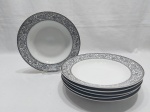Jogo de 6 pratos fundos em porcelana Real com guirlanda de flores e friso prata. Medindo 23cm de diâmetro.