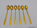 Jogo de 6 colheres longas, bailarinas em aço inox dourado. Medindo 19,5cm de comprimento.