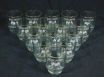 Quinze copos em vidro translúcido decorados com logo e marca BACARDI. Alt. 7,5 cm.