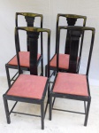 Quatro cadeiras de madeira laqueadas na cor preta, assento forrado em tecido na cor vermelha. Apresenta desgastes da laca. Alt. 101cm.