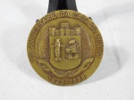 Medalha em bronze em comemoração ao 65º Aniversário da Casa do Minho - 1923/1988. Diam. 7cm.