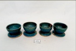 4 Porta Ovos Em Cerâmica  vitrificada Azul . Medida : 3 cm altura x 4 cm diâmetro.