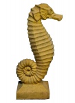 Elemento decorativo em argamassa pintada na cor amarela representando Cavalo Marinho . Med.70 cm alt (a peça está chumbada , retirada por conta do arrematante em Copacabana)