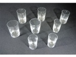Oito copos em cristal translúcidos para aperitivos e vodca, Alt. 9, 8, e 7, Diam. 5 e 4 cm. Este lote encontra-se em Nogueira.