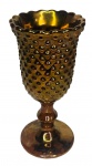 WEISS - Inusitada taça em porcelana Weiss laqueada em bronze dourado com borda em movimento. Possui registro da manufatura. Mede 18cm altura.