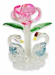 JAPÃO - Graciosa escultura em cristal japonês representando flor com cisnes, acondicionado em caixa original. Possui registro da manufatura. Mede 7 x 8cm.