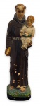 Antiga imagem em estuque representando Santo Antônio em policromia. Marcas do tempo. Mede 16cm.