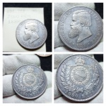 013 - Moeda Brasil Império 3º Sistema  2000 réis 1888 SOB/MBC bela patina.  Referencia de Catalogo Bentes MBC - 200,00 / SOB - 400,00 / FC - 700,00  - OBS: a moeda apresenta algumas batidas no campo no reverso e uma batida no campo no anverso.