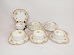 Jogo de 6 Xicaras de Chá porcelana manufatura  Regal  Japonesa  esmaltada  com flores .  medida 5,5 cm x 9 cm e pires 14 cm sendo 1 pires com bicado