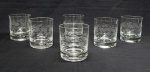 Magnífico conjunto de seis copos para whisky em cristal translúcido lapidado com ramos horizontais. Alt. 10cm.Imperdível.