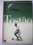Livro - TOSTÃO - Lembranças, Opiniões, Reflexões sobre Futebol - Autor: Eduardo Gonçalves (Tostão) - Prefácio de Armando Nogueira - Ano 1997 - 1ª Edição - Editora DBA - Brochura - Livro em bom para muito bom estado de conservação, contendo 170 páginas, ilustrado. OBS. Lombada levemente deitada. 