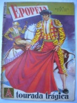 Gibi - EPOPÉIA - Nº 10 - Maio de 1953 - Editora Ebal - Formato Manchete - Quadrinização do romance A TOURADA TRÁGICA - Bom estado de conservação, contendo 52 páginas. OBS. Cortes com recuperação na lombada. Pequenas marcas de dobras. Lombada da capa colada ao miolo
