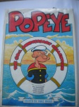 HQ - POPEYE - THE 60th ANNIVERSARY COLLECTIONON - (São as histórias em HQ, em cores e P & B do Popeye entre 1929 a 1989) - With Contributions from BILL BLACKBEARD e outros - CAPA DURA - Formato 27 X 35 cm - Editora Edite by Mike Higgs - Ano 1989 - Muito bom estado de conservação, contendo 132 páginas.