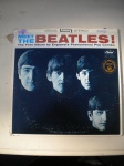 Disco Vinil 33 RPM - MEET THE BEATLES <<<<<<< THE FIRST ALBUM BY ENGLAND'S PHENOMENAL POP COMBO - ST-2047 - Selo Capitol Records - Sem data - AUDITED AND CERTIFIED BY GOLD RECORD AWARD >>>>>>> (O primeiro álbum do fenomenal conjunto pop da Inglaterra) - Disco procedente dos Estados Unidos - Disco e capa em muito bom estado de conservação.