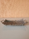Antiga saboneteira de metal cromado dos anos 80. O item é ricamente detalhado e está em bom estado de conservação.Tamanho: 17 X 9cm; alt: 1cm.