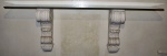 Console de parede com base formada em madeira entalhada com pintura branca encimada por tampo de vidro de 6mm. Med 51cm x 140cm x 28cm.