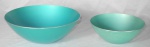 Dois bowls da Noruega em alumínio anodizado. Selo no verso. Uma delas com sinais de uso. Méd.: 8x20cm e 10x28cm.