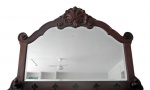 Espelho estilo Dom Jose em madeira nobre com moldura recortada encimada por florão conchiado. Superfície interior com vazados no feitio de flores. Med.: 93x135cm. Espessura: 12cm.