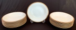 BOHEMIA - Conjunto c/ 18 pratos fundos em porcelana com frisos dourados e realces escuros com folhagens e volutas. Med.: 4x24cm. Peças numeradas feitas CZECHOSLOVAKIA.