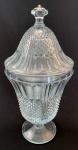 Antigo compoteira em vidro prensado com lapidação sulcado e bico de jaca. Med.: 31x15cm.