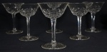 BACCARAT - Conjunto com 6 taças p/ champangne em cristal francês com rica lapidação. Chancela da Cristalerie na base. Med.: 13x9,5cm.