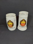 2 canecas de chopp com logo para colecionador em ceramica. Medida: 15 cm x 6 cm e 13 cm x 7 cm
