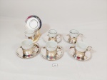 Jogo de 6 xicaras de café em porcelana branca e friso prata com suporte em prata 90 aurea . Medida:  xicaras 5 cm x 4,5 cm pires 10 cm .