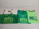 2 Camisas femininas corrida  Rio city e Rio Meia Maratona Olympikus 2018 tamanho GG e 2 bolsas;. Sem uso