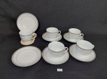 Jogo de 5 Xicaras de Café e 6 pires decorada borda Prateada em Porcelana Royal castle Medida: xicara 5 cm x 6 cm e pires 11 cm diametro