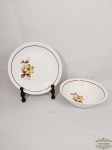 2 Travessas Rendondas sendo 1 Funda e 1 Rasa em Porcelana Floral Nadir. Medida:26 cm e 23,5 x 7 cm travessa rasa bicado borda