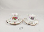 2 Miniaturas Xícaras coleção  Porcelana  inglesa Queens  Inglesa Decorada Flores  e Mês Janeiro e Fevereiro . Medida: 4 cm x 4 cm e pires 7,5 cm