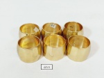 Jogo de 6 argolas porta guardanapo em metal dourado indiano. Medida: 3 cm