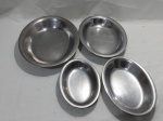Lote de 4 travessas ovais em aço inox Tramontinox. Medindo o maior 29,5cm x 23cm.