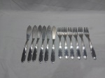 Jogo de 12 talheres de peixe  em aço inox Hercules. Medindo 6 facas 19,5cm de comprimento e 6 garfos 17cm de comprimento.