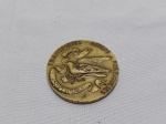 Medalha comemorativa 50 anos da TAP (Trasportes Aéreos Portugueses), em bronze. Medindo 5cm de diâmetro.
