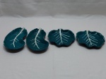 Lote de 4 petisqueiras em porcelana na forma de folha. Medindo a maior 18cm x 11cm.