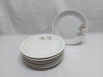 jogo de 8 pratos rasos em porcelana Renner com friso ouro. Medindo 25cm de diâmetro.