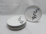 Jogo de 6 pratos de sobremesa em porcelana Real, floral com friso prata. Medindo 19cm de diâmetro.