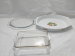 Lote composto de travessa oval em porcelana. travessa retangular em vidro temperado e travessa oval em vidro temperado. Medindo a travessa em porcelana 33,5cm x 25cm x 5cm de altura.