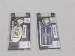 Lote de 2 chaveiros oficiais do time Real Madrid. Lacrado, medindo o maior 8,5cm de comprimento.