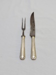 Par de talher de servir em prata 90 argentina com lâmina de aço carbono. Medindo a faca 28cm de comprimento e o garfo 24cm de comprimento.