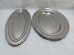 Jogo de 2 travessas ovais em aço inox Fracalanza. Medindo a maior 47cm x 34,5cm