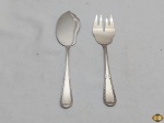 Par de talher de servir peixe em prata 90 Wolff, modelo couro de cobra. Medindo a faca 25cm de comprimento e o garfo 22cm de comprimento.