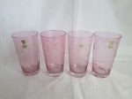 Jogo de 4 copos longos em cristal rosa Hering lapidado. Medindo 13,5cm de altura x 7,5cm de diâmetro.
