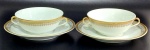 PORCELANA STEATITA - Lote contendo 02 (dois) consumés e seus respectivos pratos em porcelana manufatura Steatita decorados por faixas de arabescos em ouro - em excelente estado. Medem 5 X 13,5 cm cada consumé e 17,5 cm de diâmetro cada prato.