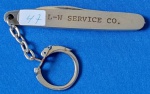 47 - CANIVETE PROMOCIONAL L - W SERVICE CO. - CUNHO STAINLESS HONG KONG - ABERTO 12 CM - FECHADO 7 CM