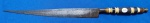 22- FACA REGIONAL MINAS/SÃO PAULO -  EMPUNHADURA DE BARRIL OU FILINGO - COMPRIMENTO TOTAL 26 CM , LÂMINA  17,5 CM - AÇO CARBONO - BOTÃO ENVIESADO - EMPUNHADURA EM ANÉIS DE CHIFRE E METAL - LÂMINA  COM LAVRADO NO TERÇO SUPERIOR