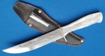 13  - FACA ESCOTEIRA - PRESTIL - ANOS 70 - PROMOCIONAL VIAN , CABO EM MATERIAL SINTÉTICO IMITANDO MADREPÉROLA - GUARDA EM AÇO - BAINHA EM COURO - SEM USO - COMPRIMENTO TOTAL 25 CM - LÂMINA 14 CM