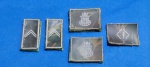 104 - 5 INSIGNIAS EB
